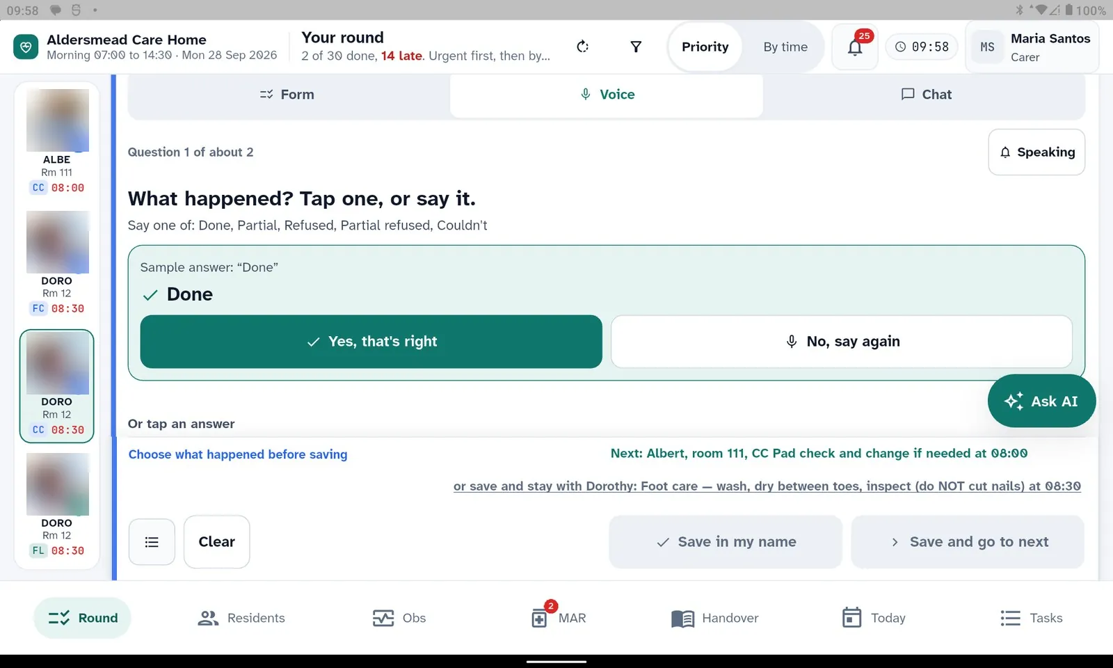 The HIRA Carer Agent tablet recording a care step by voice: question one of about two, 'What happened? Tap one, or say it', the answer the app heard, 'Done', and two large buttons, 'Yes, that's right' and 'No, say again'.